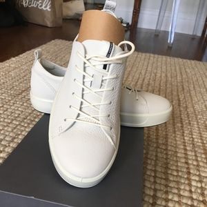 never worn clean white sneakers minimalist